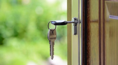 Key in lock at open home
