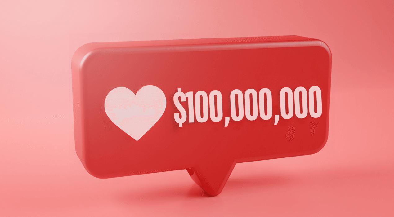 Red 3D text bubble with the text $100,000,000 and a white heart