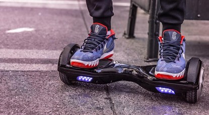 Man standing on hover board