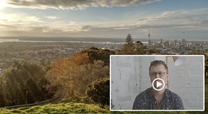 Auckland city and an image of JB and a video play button