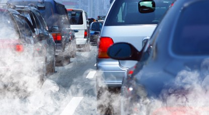 Cars in traffic letting off emission