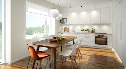 Sunny kitchen with wooden table and chairs