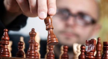 Man playing chess, close-up