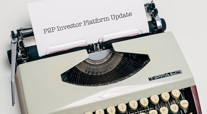 Typewriter, white paper that reads P2P Investor Platform Update
