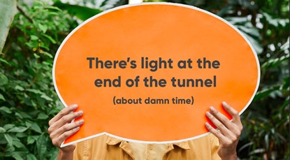 Sign saying there's light at the end of the tunnel